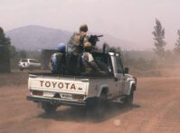Peacekeepers in back of pick up truck